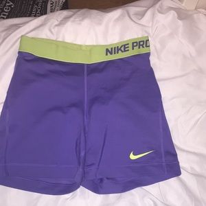 neon purple+yellow nike pros